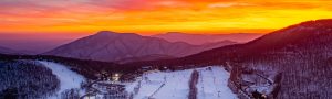 Image of sunset over the Mountain Village of Wintergreen Resort